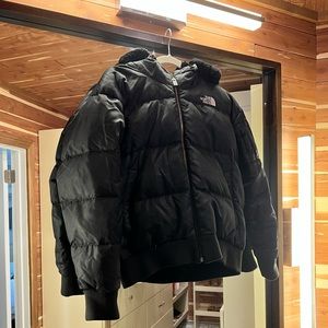 Black down North Face puffy jacket with black fur, detachable hood.